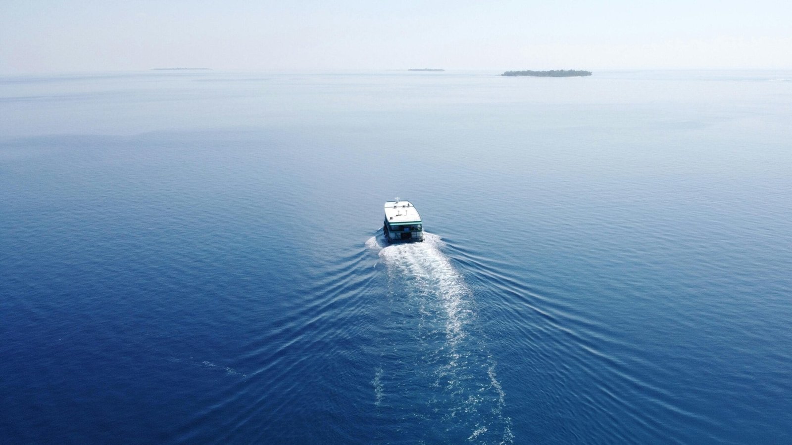 Local Ferry driving on the sea in the Maldives